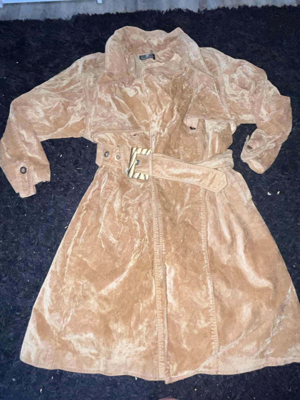 Vintage Safaling’s Window tan suede peacoat.